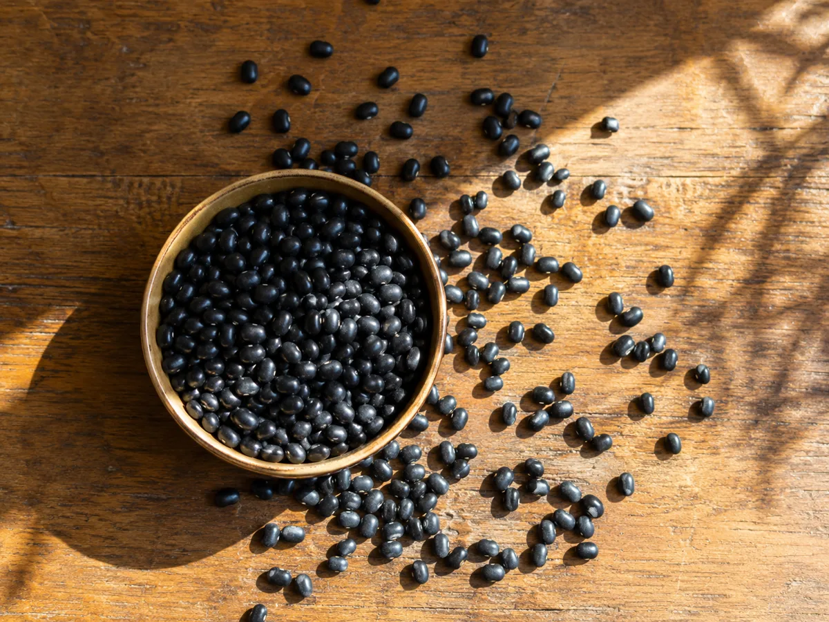 Cooked black beans in a bowl for a blood pressure-friendly food guide.