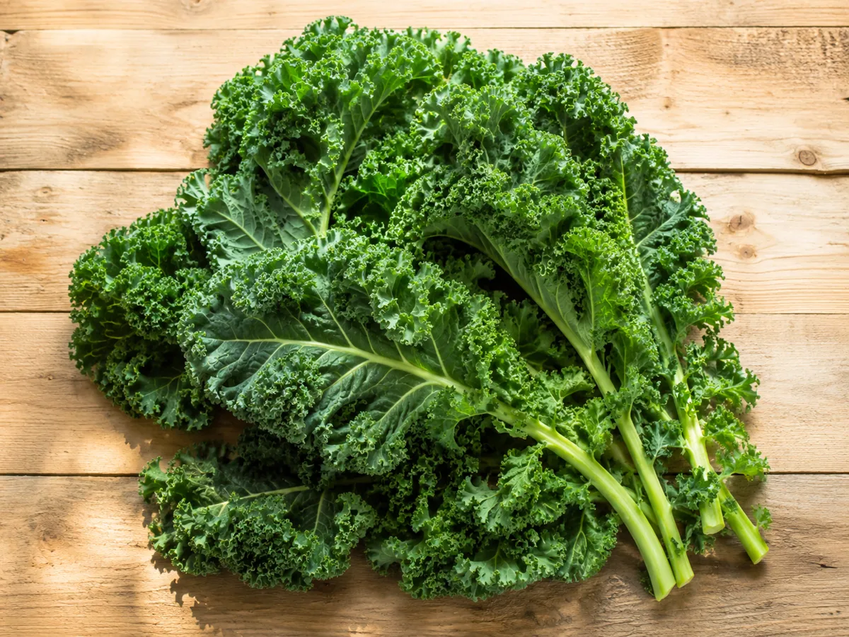 A bunch of fresh curly kale for a blood pressure-friendly food guide.